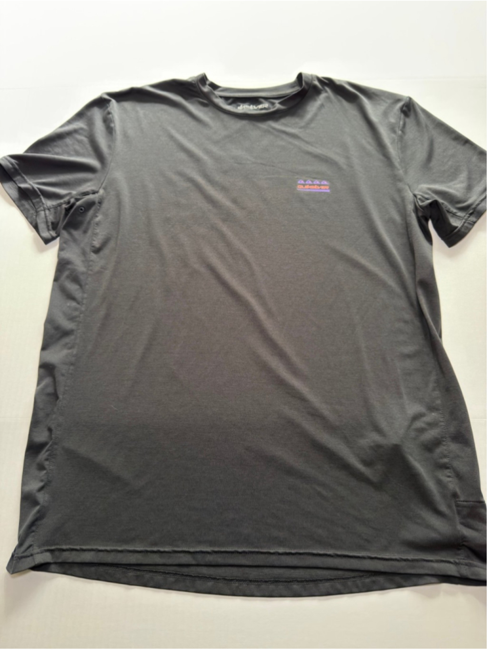 Quicksilver black dry flight featuring purple and pink stylized logos sz L